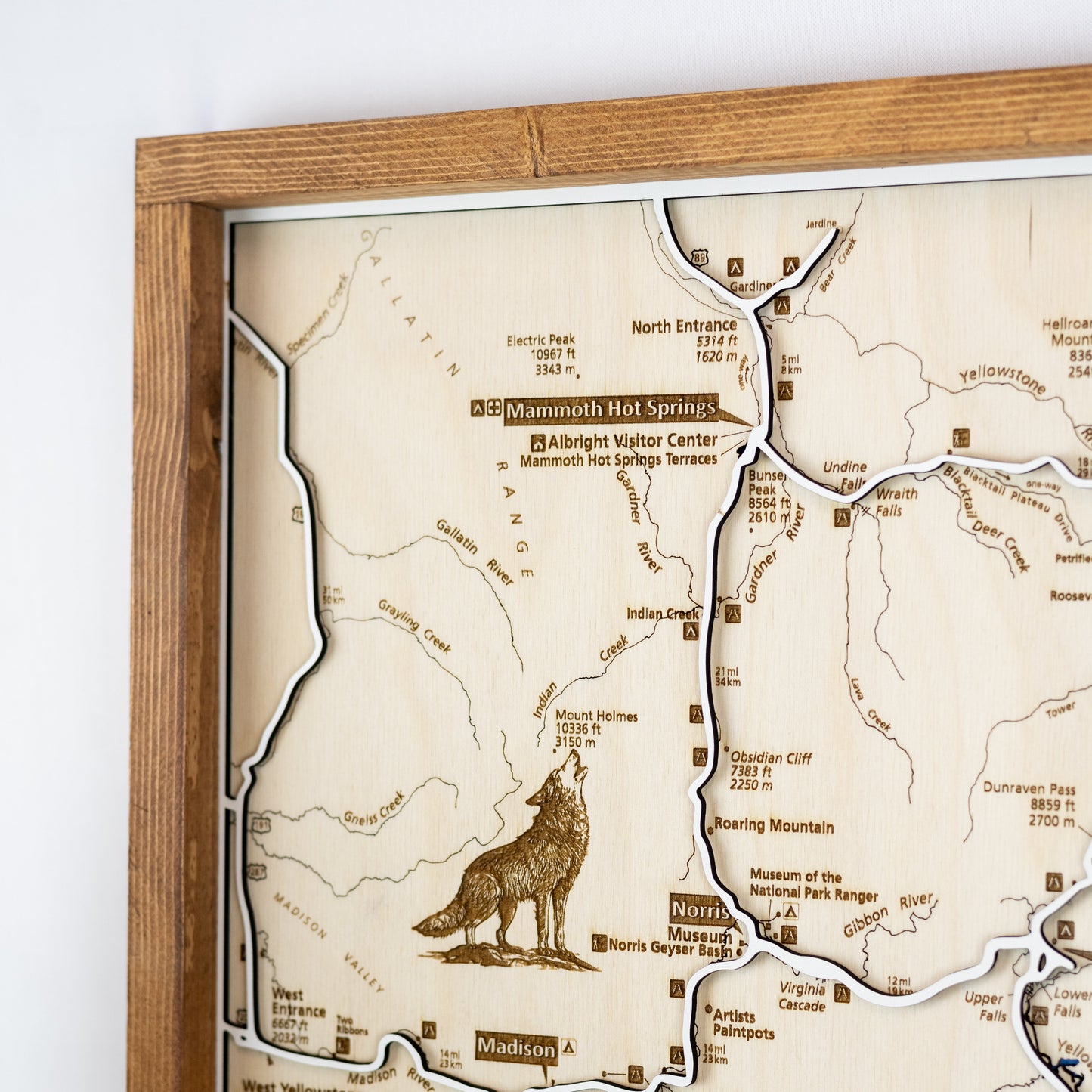 Yellowstone National Park close up of top left corner featuring trail names, famous landmarks, and wildlife details
