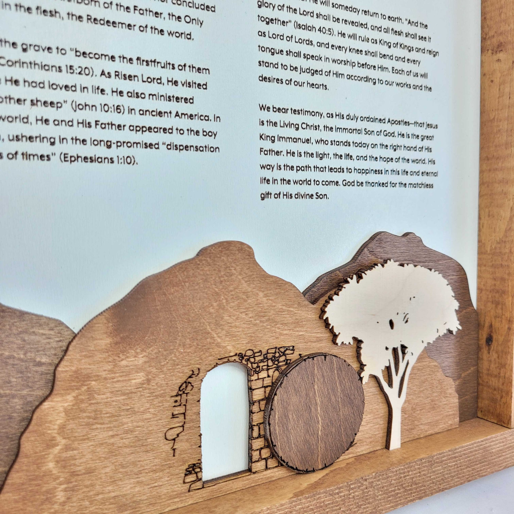 The Living Christ wooden sign with resurrection tomb scene